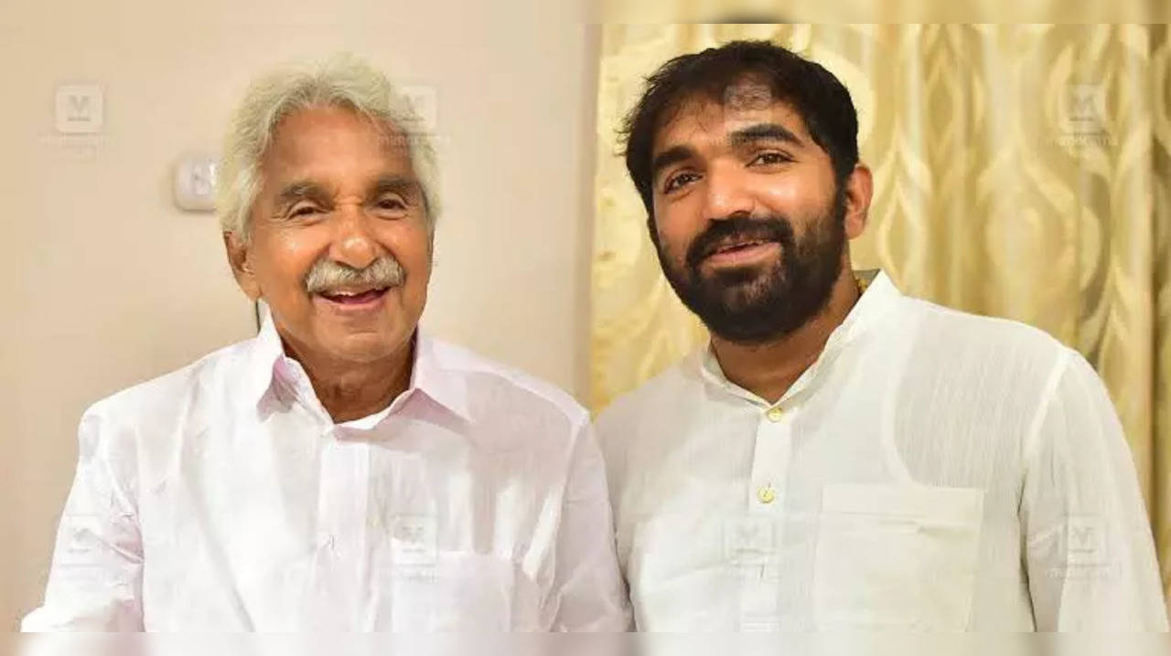 Oomen_Chandy_son_father.