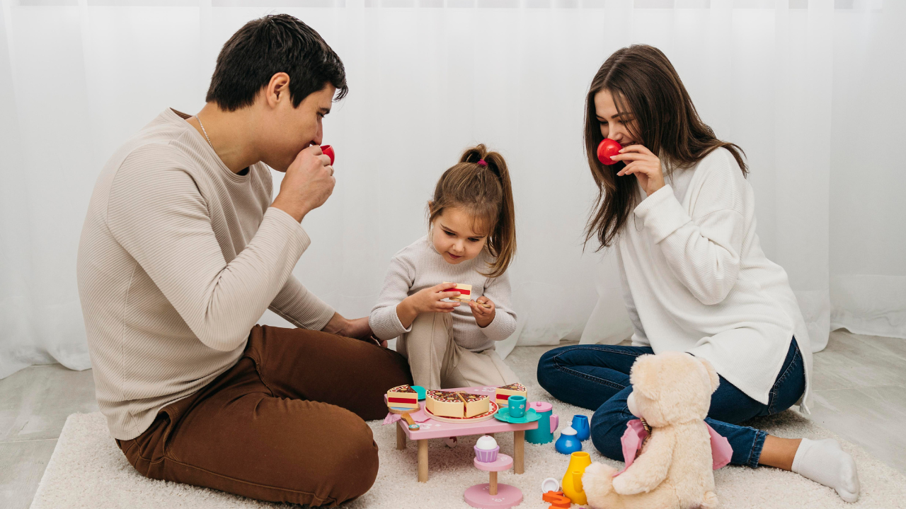 Children playing with parents