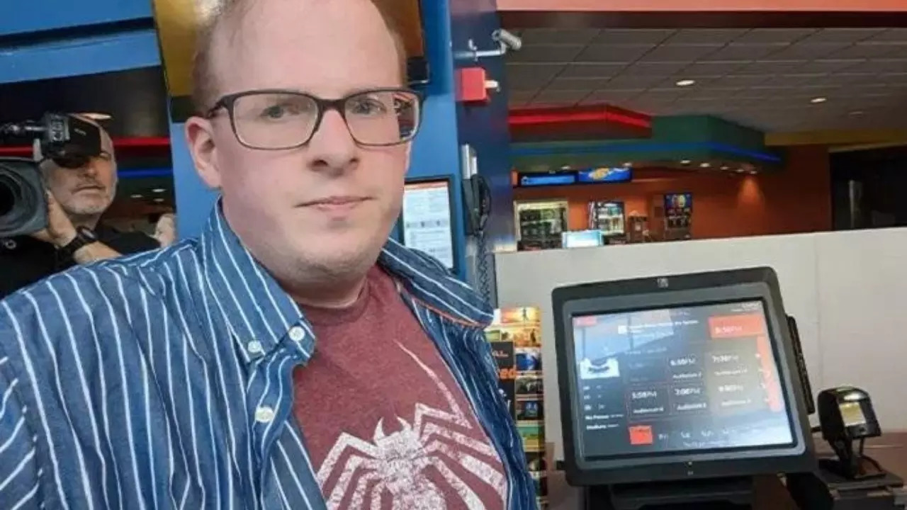 Zachariah Swope buys movie tickets at a theatre during his 777-film marathon. | Image courtesy: Guinness World Records