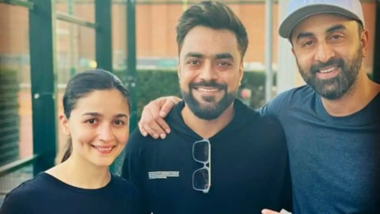 Rashid Khan poses with Alia Bhatt and Ranbir Kapoor