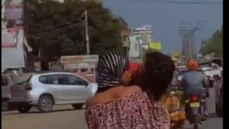 A couple in Rajasthan's Jaipur was caught on camera kissing on a moving bike.
