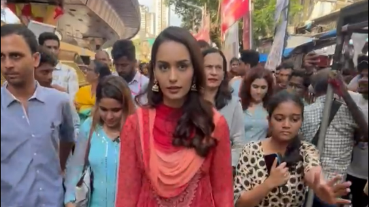 Manush Chhillar Dazzles In Traditional Red Dress As She Visits Lalbaugcha Raja To Seek Blessings