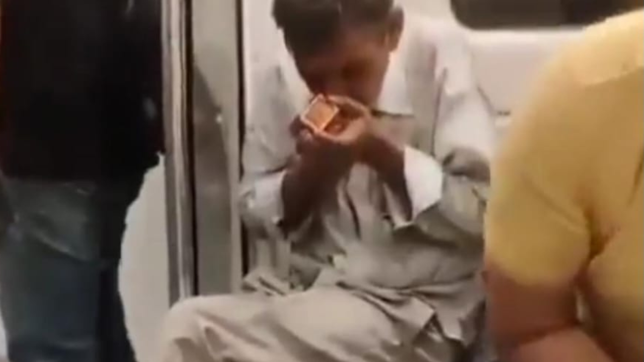 Man Smoking Inside Delhi Metro Coach