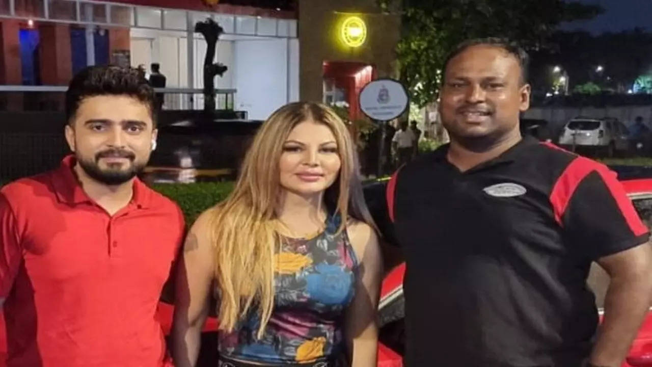 Rakhi Sawant and Adil Khan Durrani with Zakeer Bhai