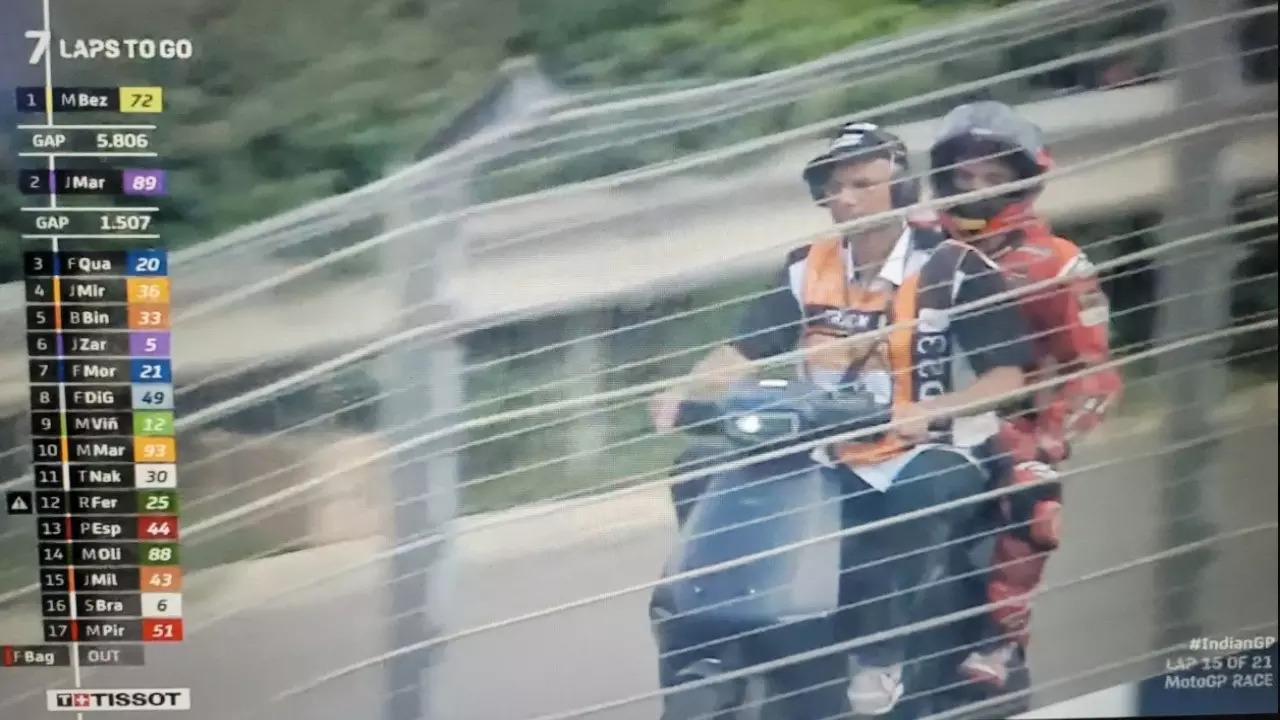 Current MotoGP championship leader Francesco Bagnaia, on an Ola Scooter.