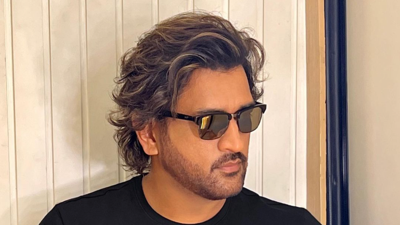 Mahendra Singh Dhoni sports a new hairstyle reminiscent of his 'vintage' long hair. | Image courtesy: Aalim Hakim