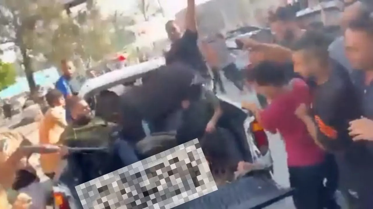 In Israel, Woman Naked On A Car, Assaulted By Hamas Militants, Video
