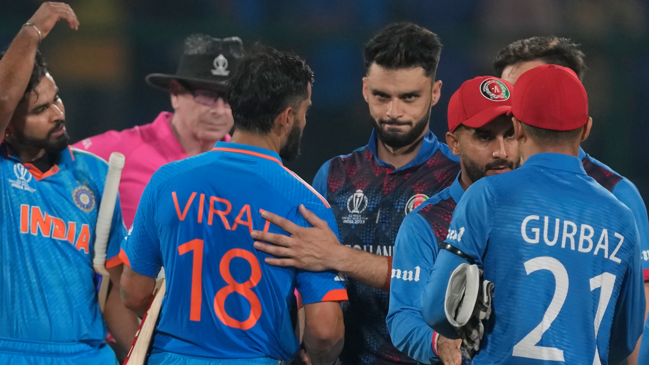 kohli naveen hug ind vs afg ap