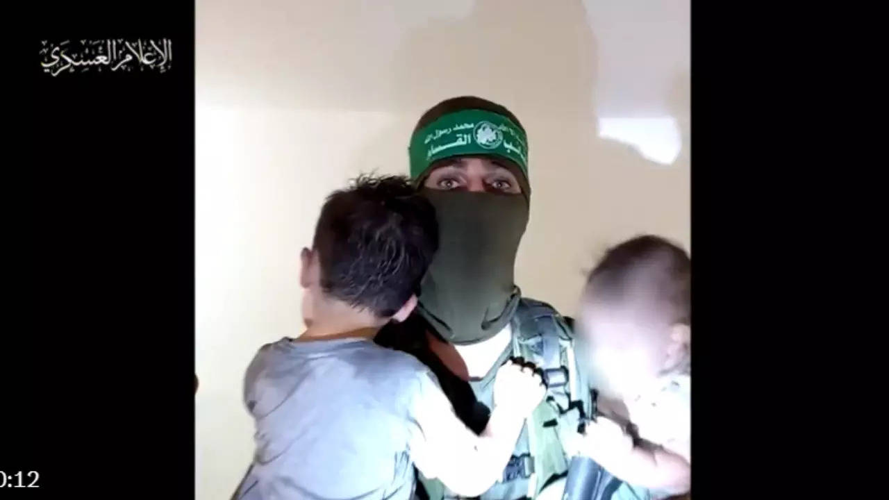 Hamas gunman with child hostages