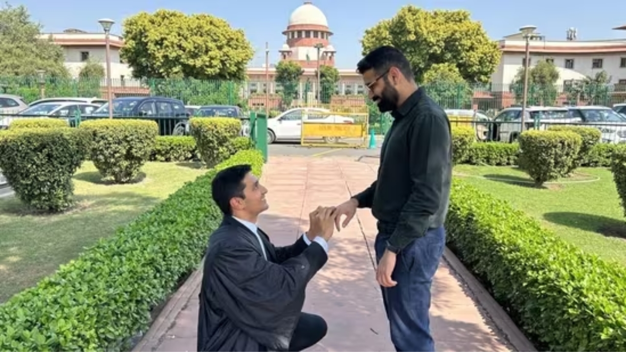 Same Sex Verdict: Gay couple exchange rings in front of Supreme Court.