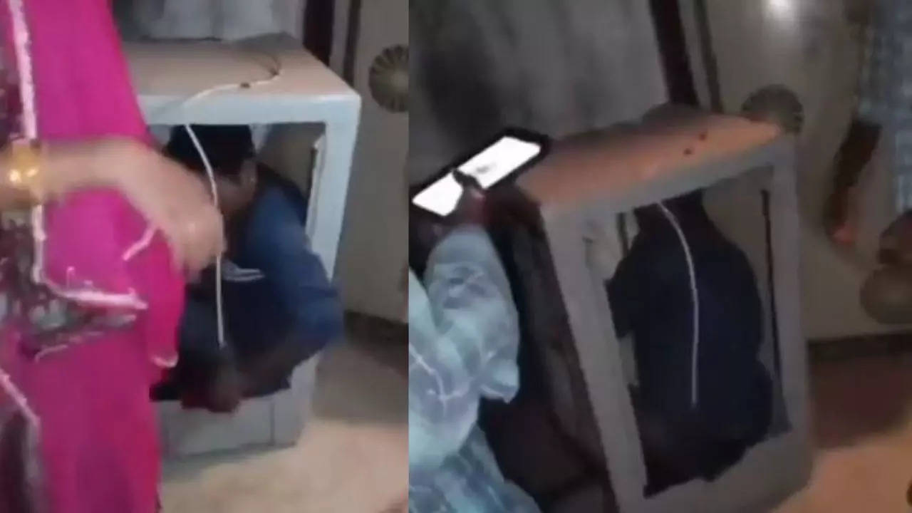 Man-Hides-Inside-AC-Cooler-Viral-Video