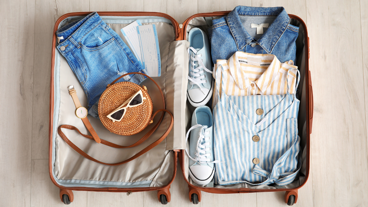 Make your travel simple and convenient by practising these 8 smart packing hacks. Pic Credit: Canva