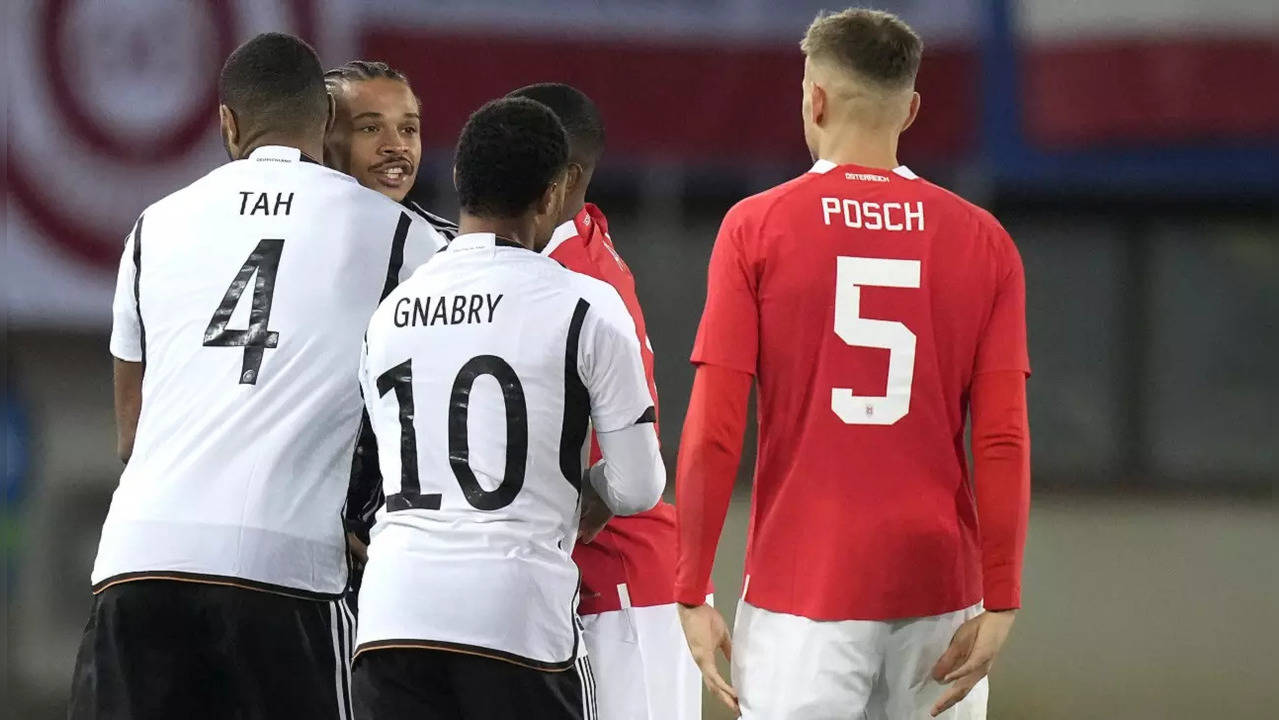 Leroy Sane reacts after receiving red card against Austria