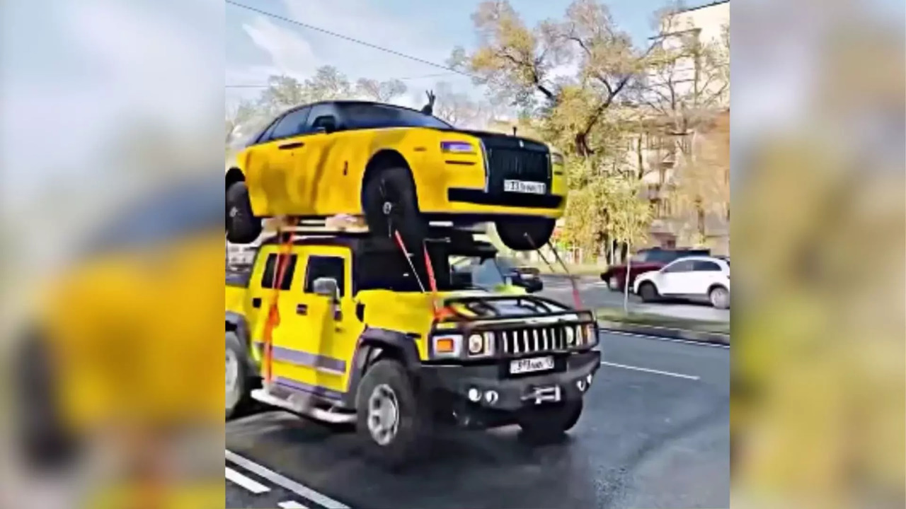 Hummer Carrying Rolls Royce