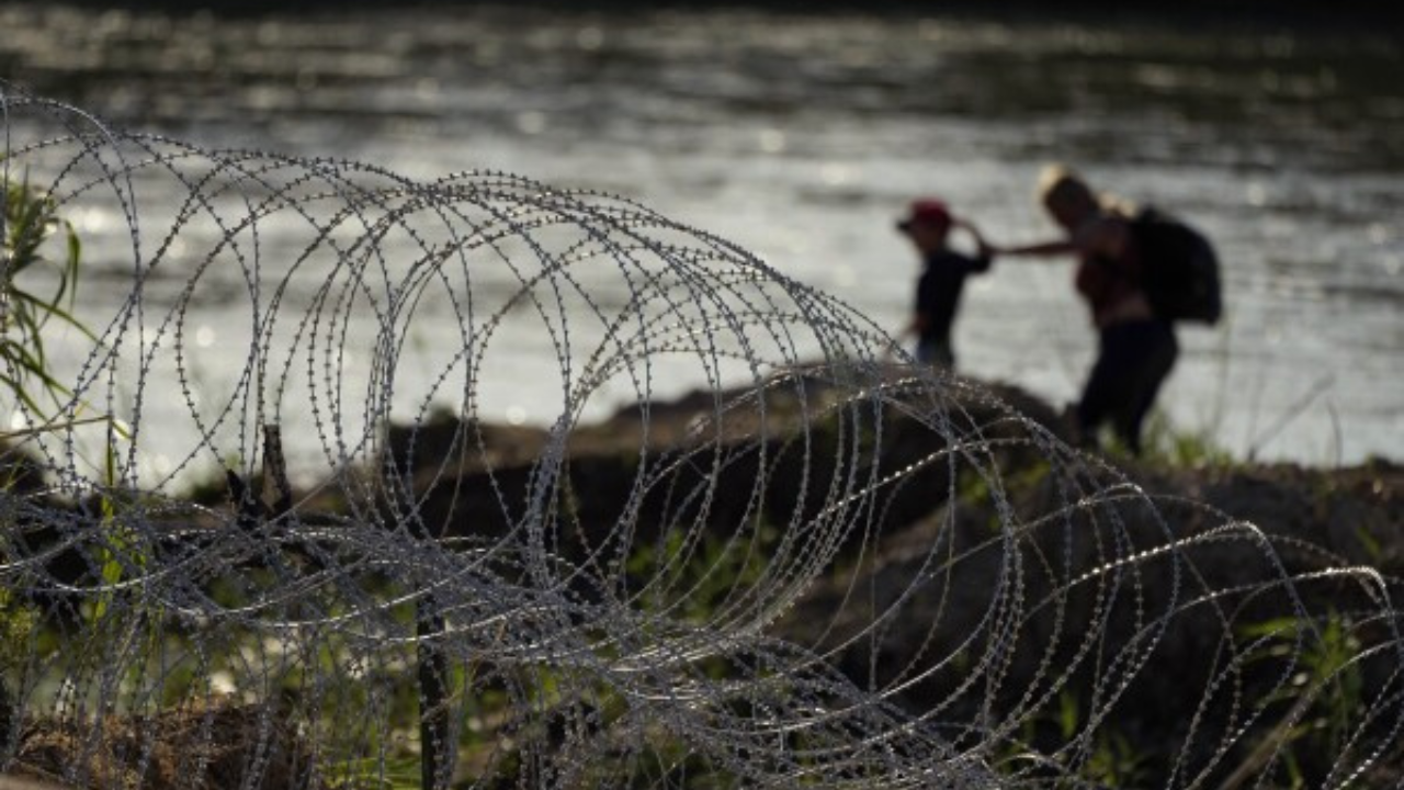 Migrants At Eagle Pass, Texas Border