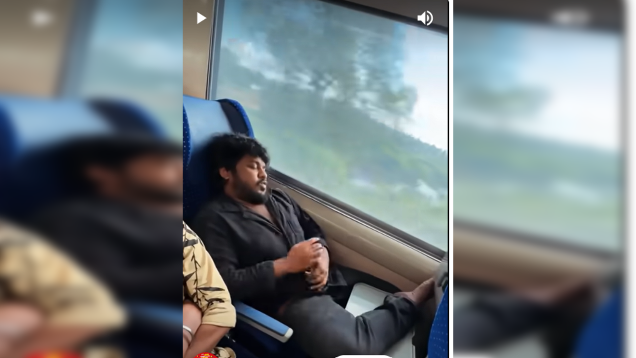 Youtuber sleeps with feet resting on food tray in Vande Bharat train