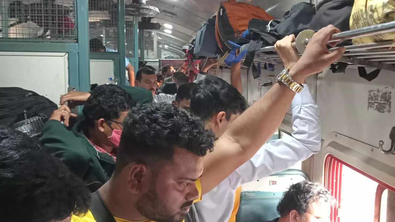 Passengers stand in the aisle of an overcrowded Rourkela-Bhubaneswar Intercity Express in Odisha. | Credit: Abhas Akumar Shrivastava