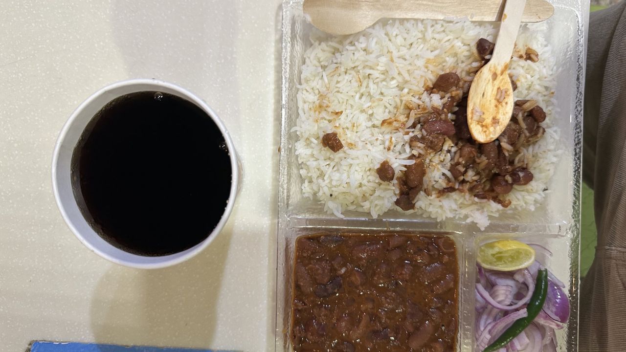 Rajma Chawal and a glass of Coke, the man ordered.