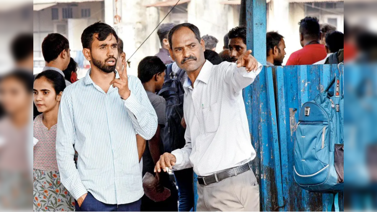 Good Samaritan Narendra Patil guides passengers before going to work 