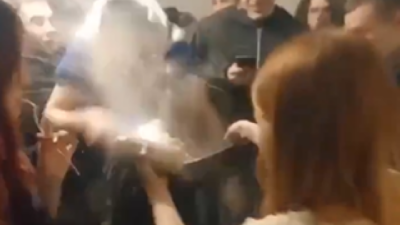 Woman Throws Boiling Water At Prankster After Smoke Bomb Joke.