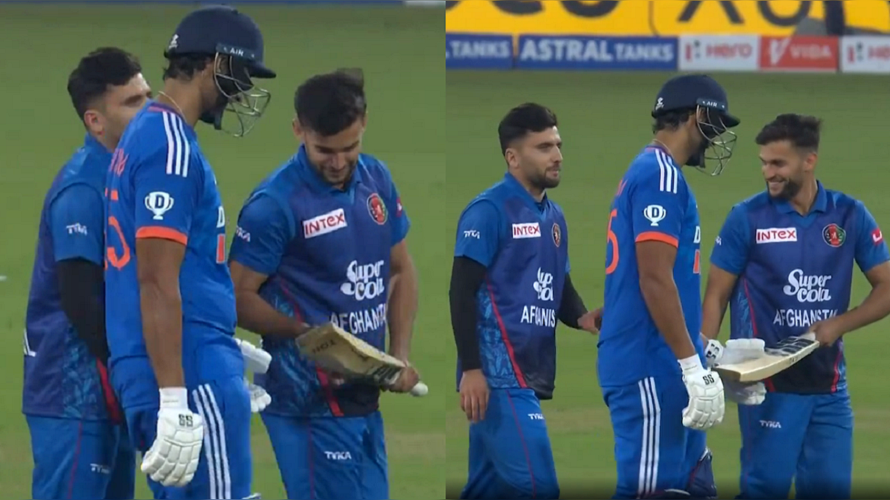 Afghanistan players check Shivam Dube's bat after he scores 63 runs from 32 balls in 2nd T20I