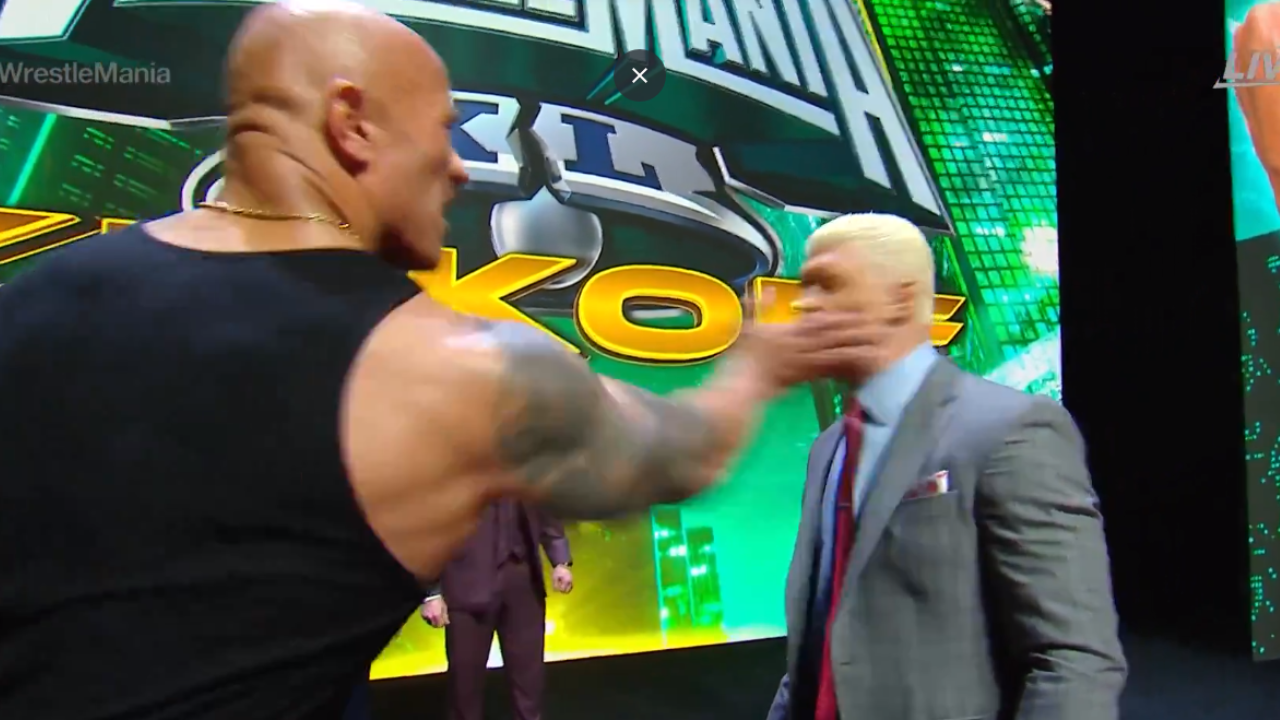 The Rock slapping Cody Rhodes