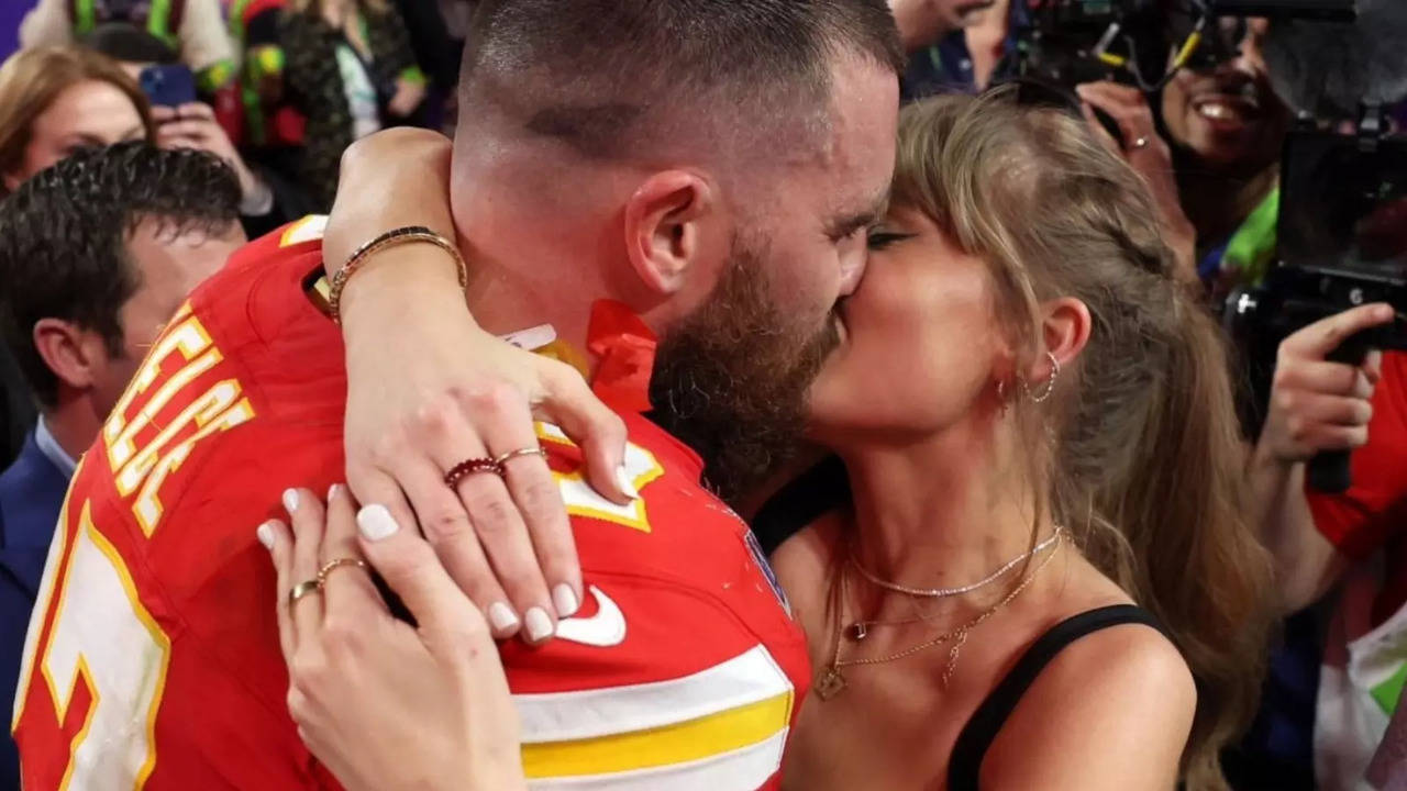 Taylor Swift and Travis Share A Kiss After The Big Win