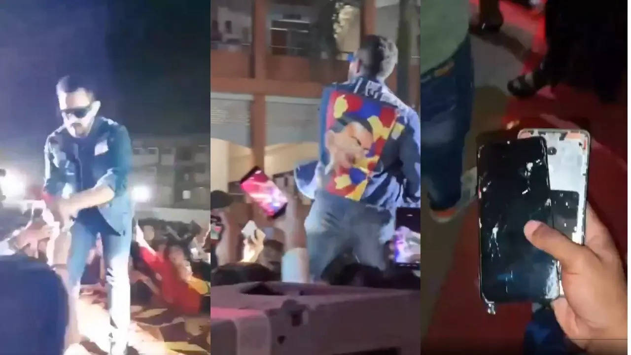 Singer Aditya Narayan snatches and throws a fan's phone during a concert. | Courtesy: Social media