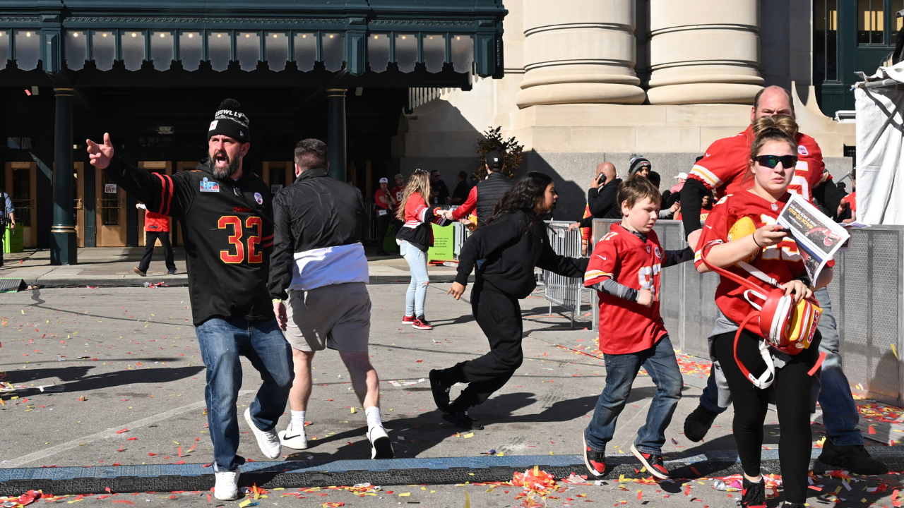 ​People run for cover after shots were fired at Union Station near the Kansas City Chiefs' Super Bowl LVIII victory parade on Wednesday