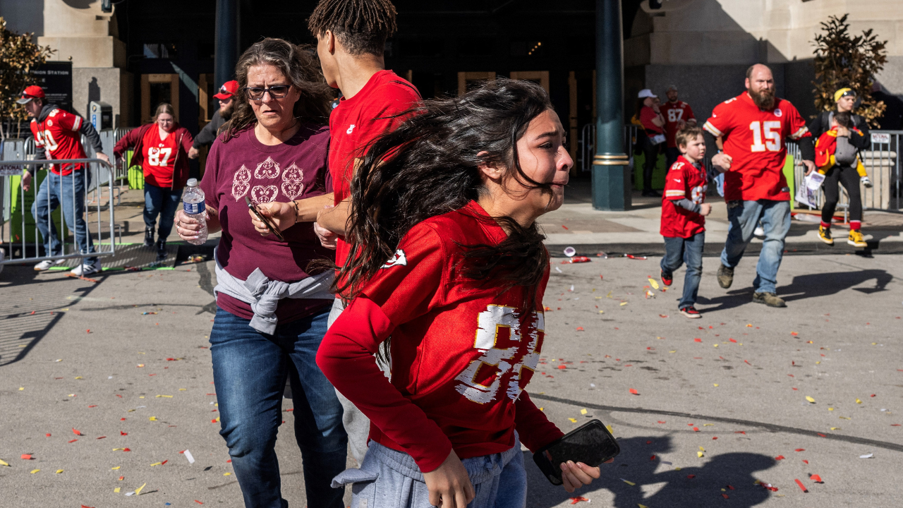 ​People scatter after shots were fired in Kansas City, Missouri, on Wednesday.