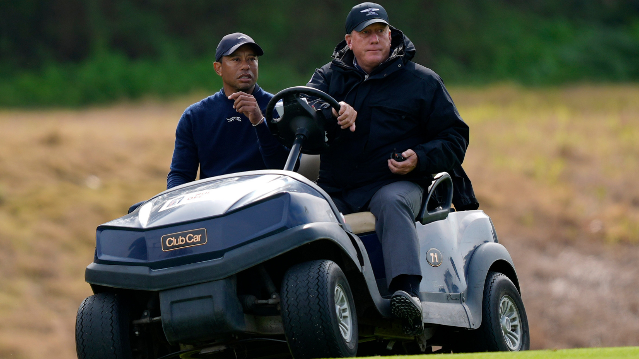 ​Tiger Woods is driven off the course after withdrawing during the second round of the Genesis Invitational golf tournament at Riviera Country Club on Friday in the Pacific Palisades area of Los Angeles.​