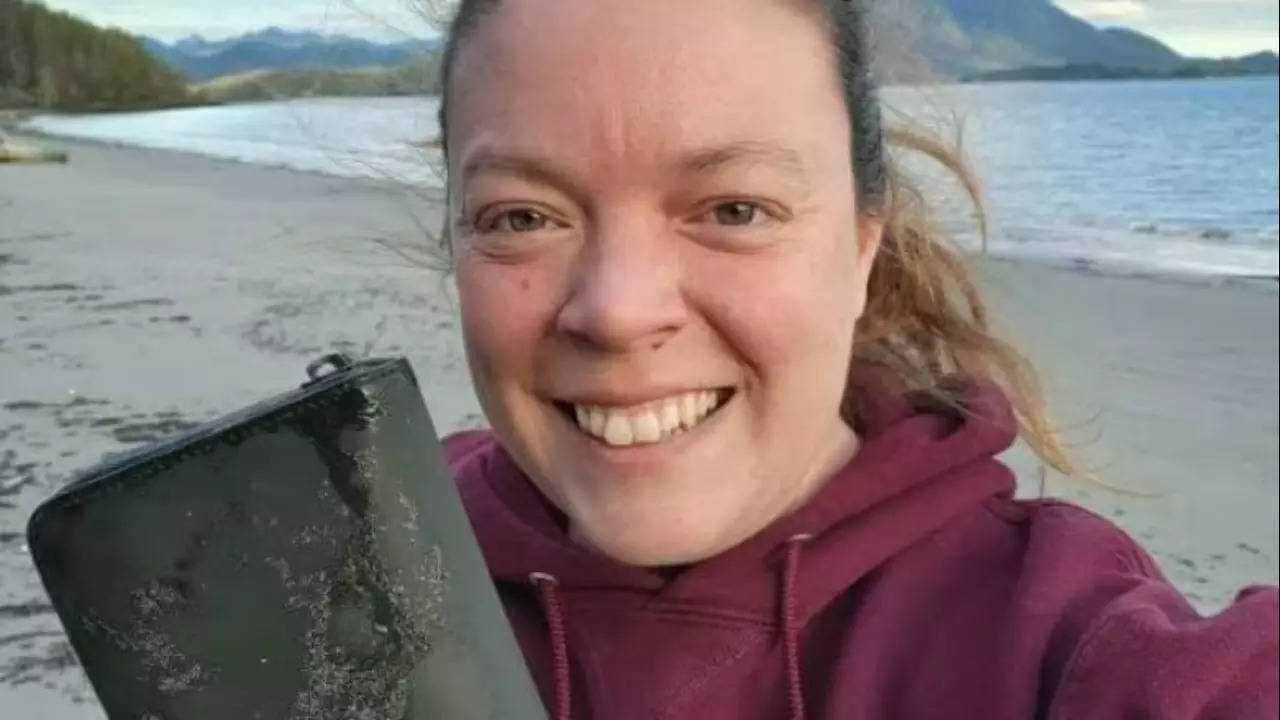 Marcie Callewaert was beachcombing when she found her exceptionally-preserved wallet. | Courtesy: CBC