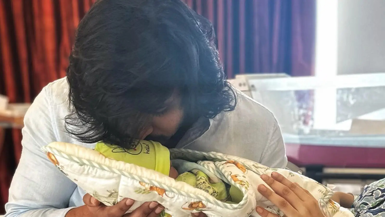 Actor Siddhartha Kissing His Newborn Child