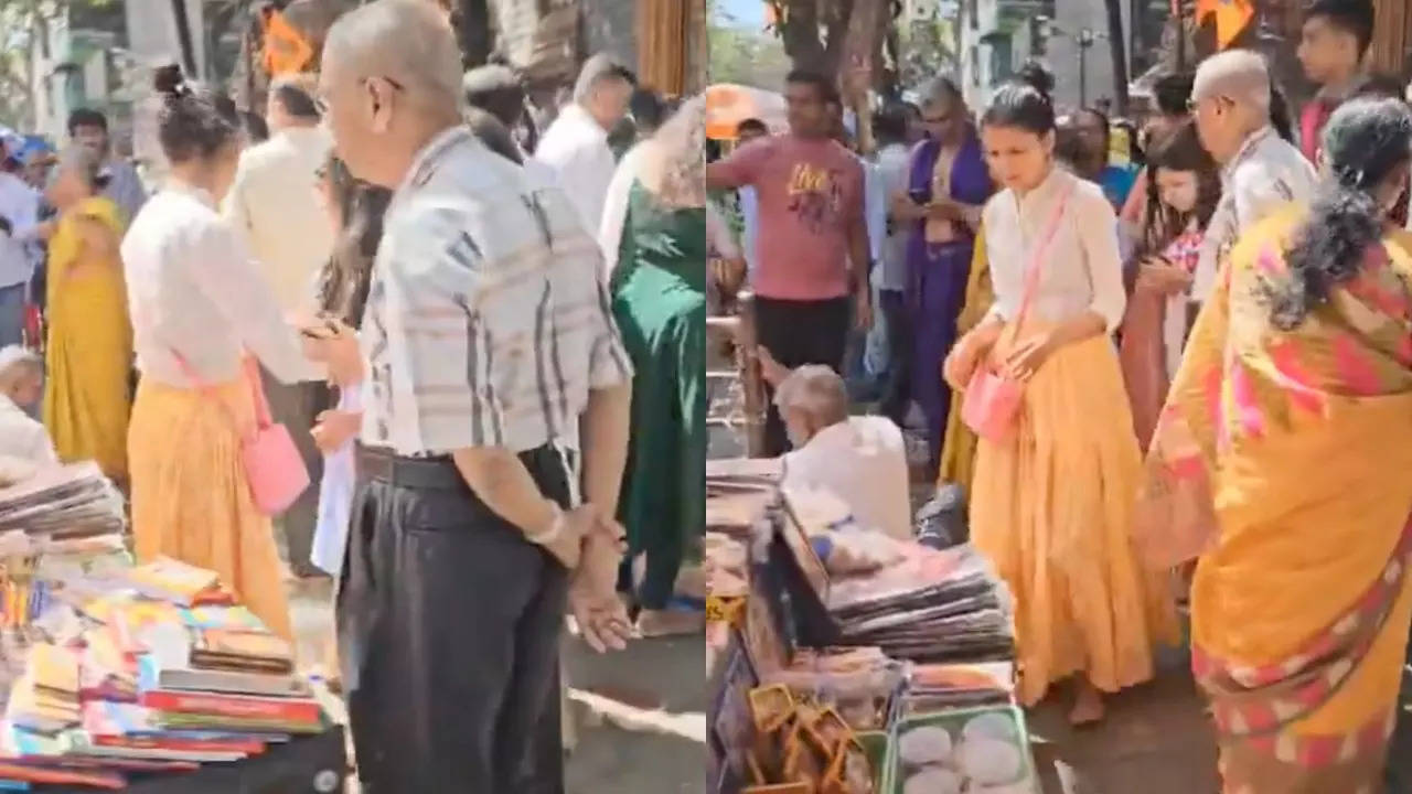 Narayana Murthy and Akshata interact with vendors outside the Bengaluru temple. | Courtesy: X