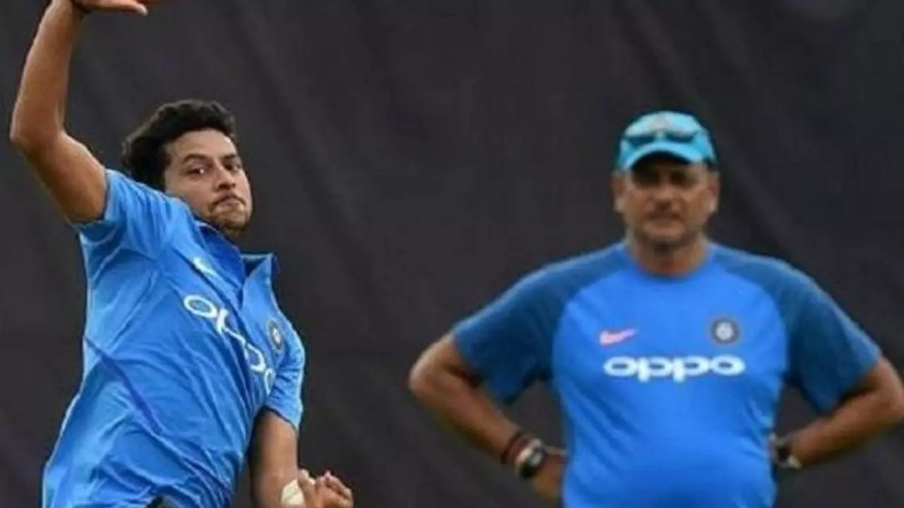 Kuldeep Yadav and Ravi Shastri.