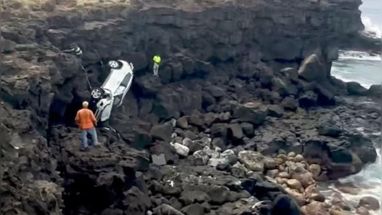 Hawaii authorities say a Canadian tourist accidentally drove off a cliff on the Big Island while driving in the dark. The was rescued later by firefighters.