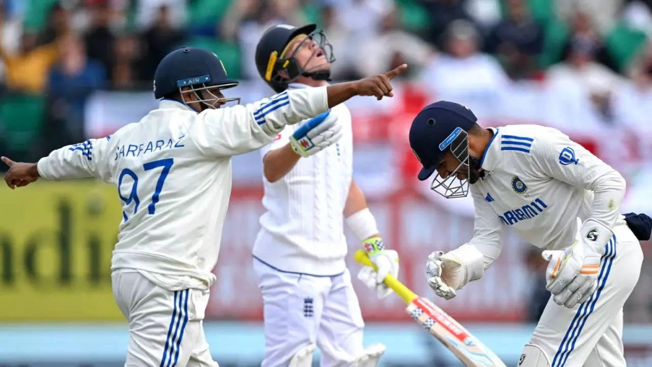 India celebate Ollie Pope's (centre) wicket during fifth Test on Thursday in Dharamsala.