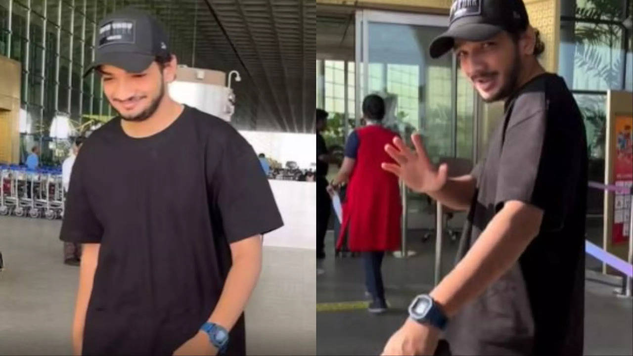 Munawar Faruqui Waves At Paps As He Gets Snapped At Airport- WatchMunawar Faruqui Waves At Paps As He Gets Snapped At Airport- Watch