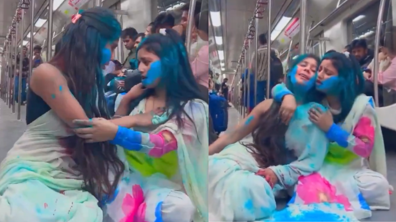 Women applying colours on each other