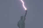 New York Storm Recap Lightning Strikes The Statue Of Liberty Boats Sink  In Pics