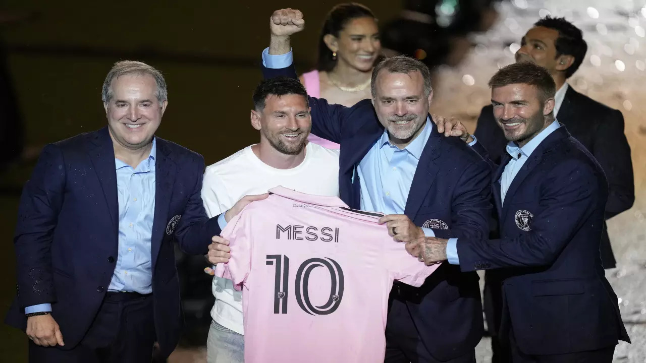 Lionel Messi with Jorge Mas and David Beckham