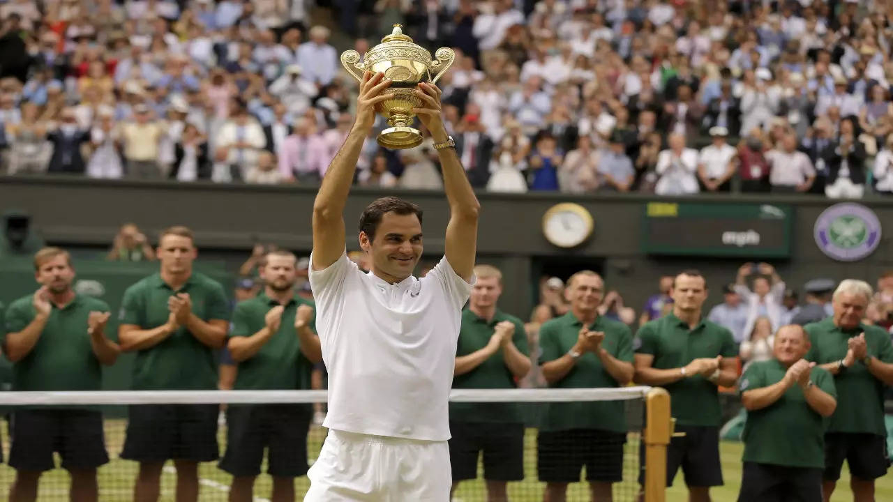 Roger Federer with his Wimbledon trophy
