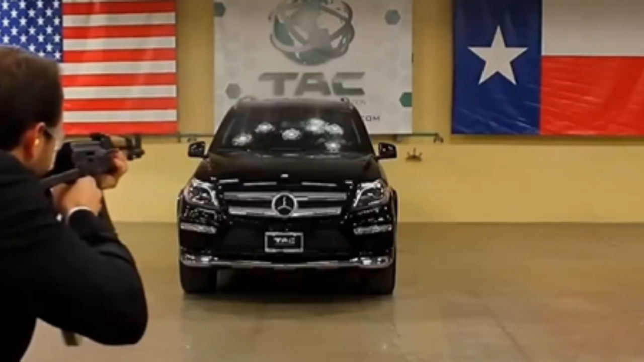 Bulletproof car company CEO takes shots from an AK-47 to prove security.