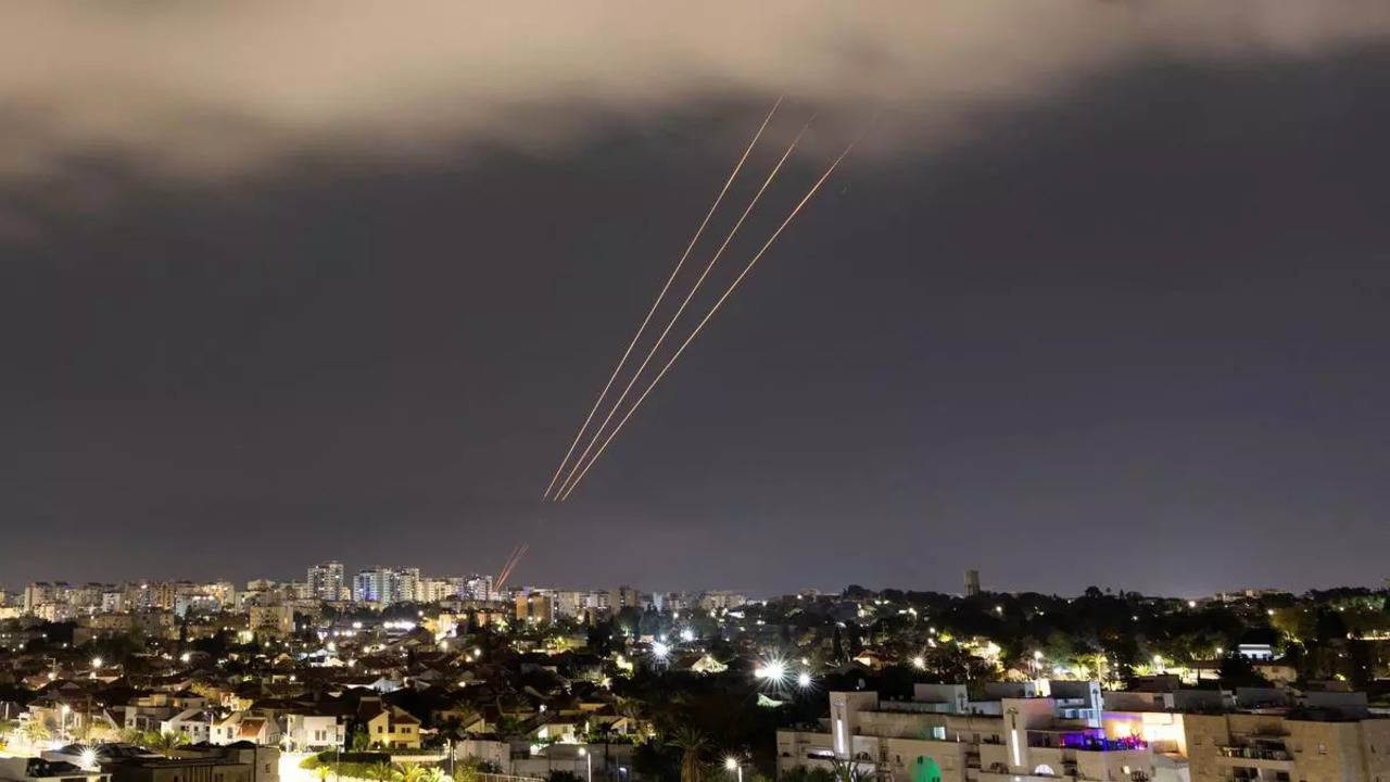 An anti-missile system operates after Iran launched drones and missiles towards Israel, as seen from Ashkelon, Israel April 14, 2024.