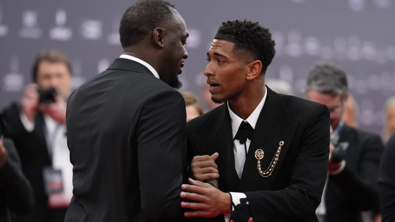 Jude Bellingham with Usain Bolt at the 25th Laureus World Sports Awards