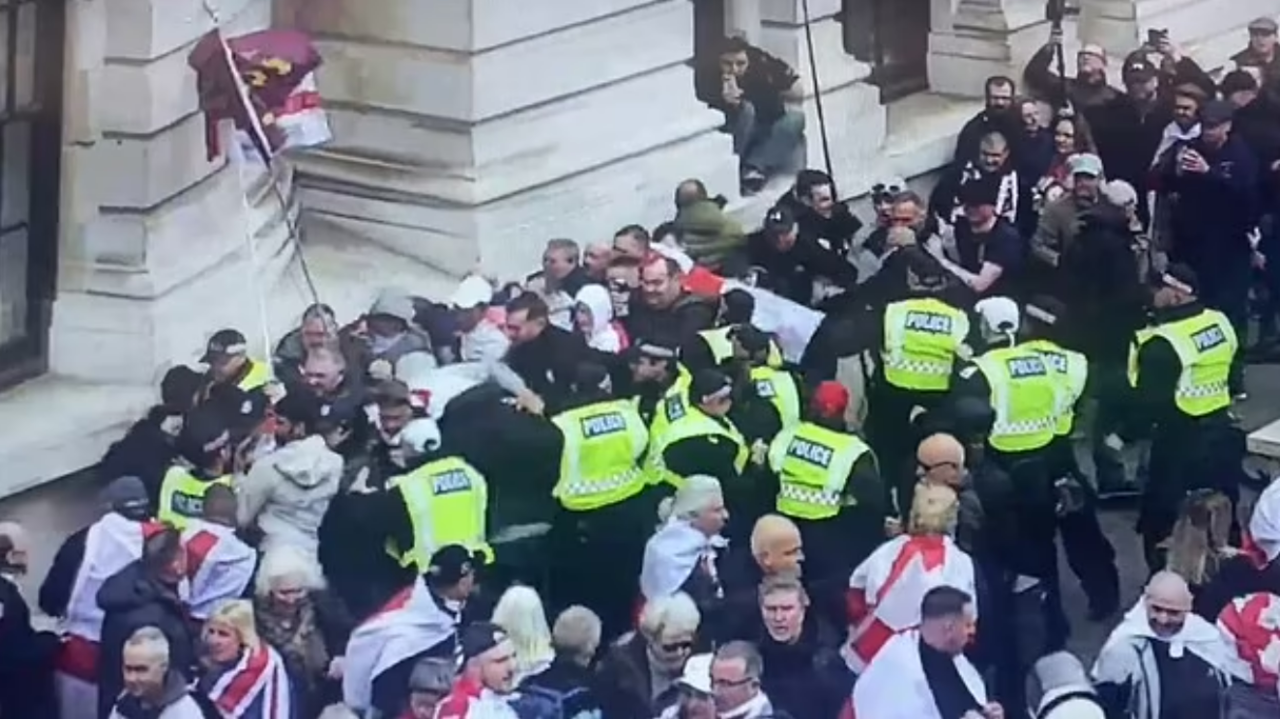 Officers from the Met Police clashed with protesters who attempted to force their way through police lines