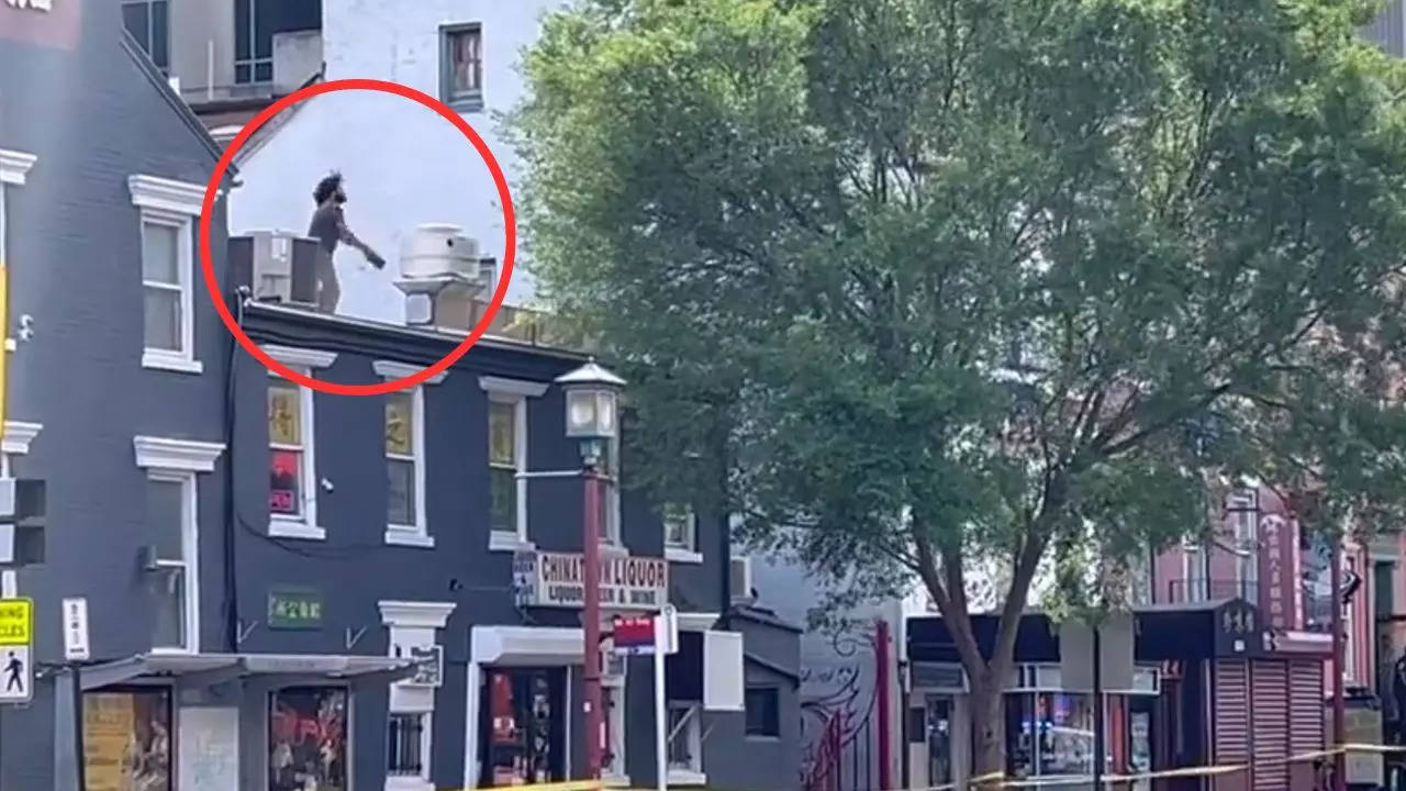 Chinatown DC: Man On Roof At 6th And H Throws Bricks At MPD Officers In Washington | VIDEO