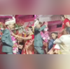 Viral Video Groom Jumps Off Chair To Put Varmala Around Bride Makes Her Fall Try Not To Laugh