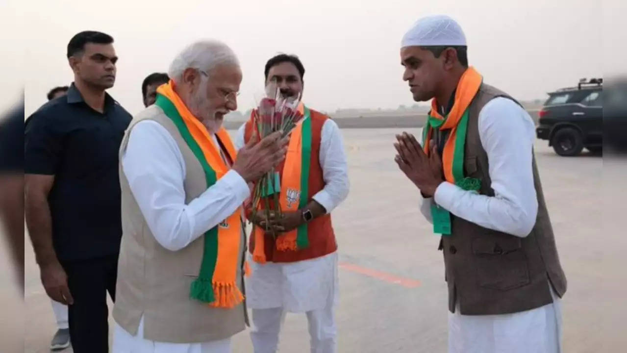 Usman Gani with PM Modi.