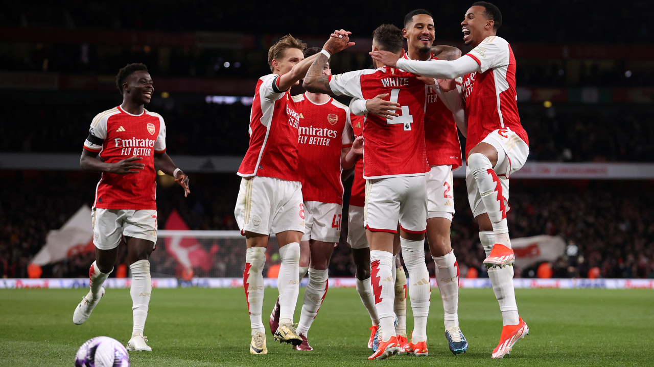 Arsenal players celebrating their 5-0 win over Chelsea